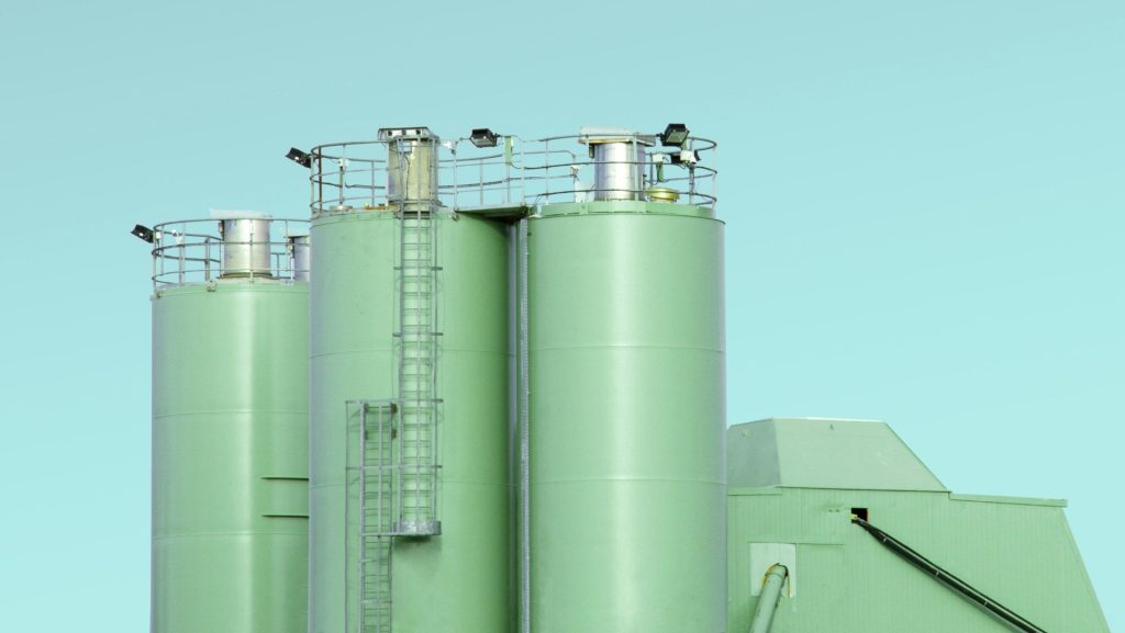 photo of teal and grey silo